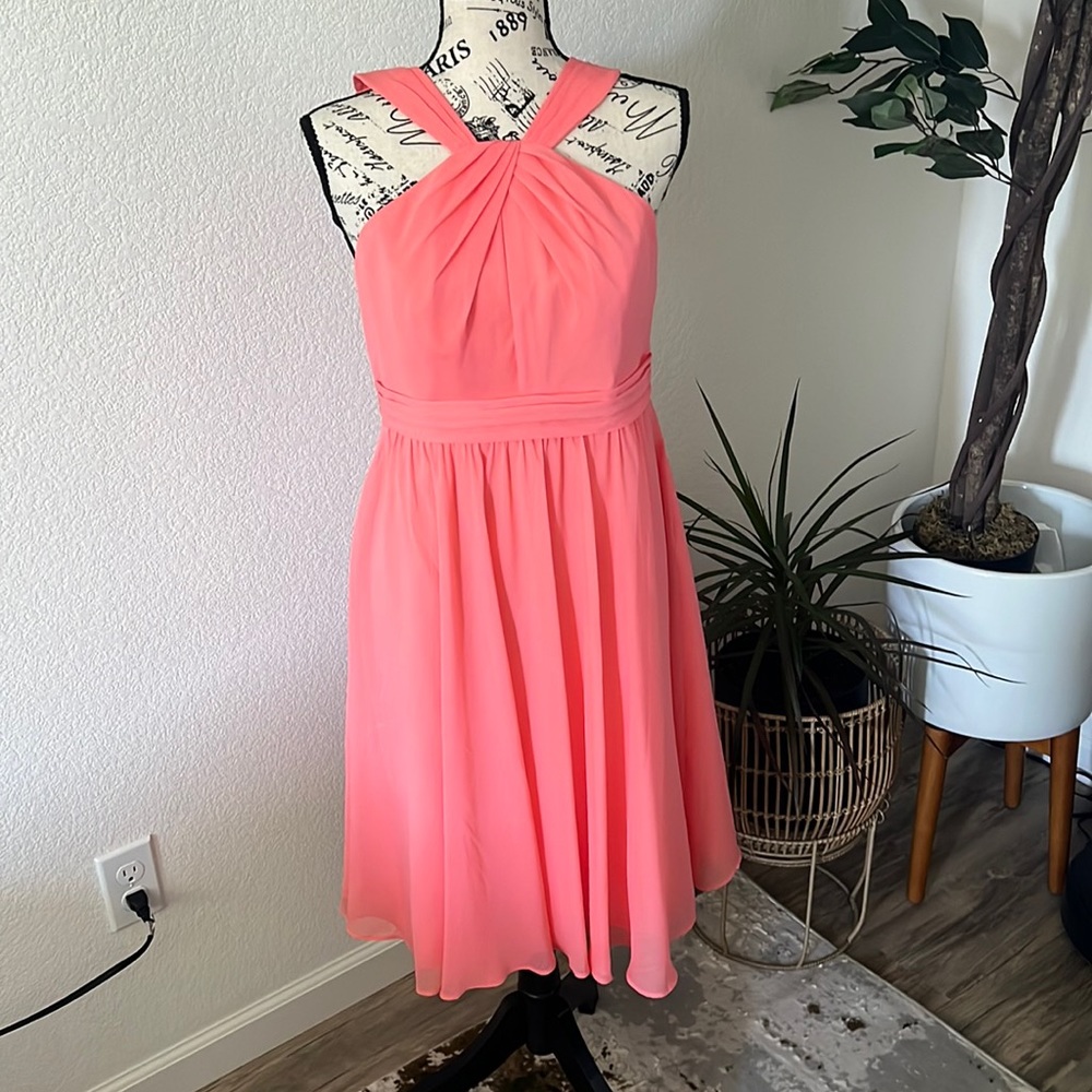 Cocktail dress. New W/O tags. Never worn after purchase.